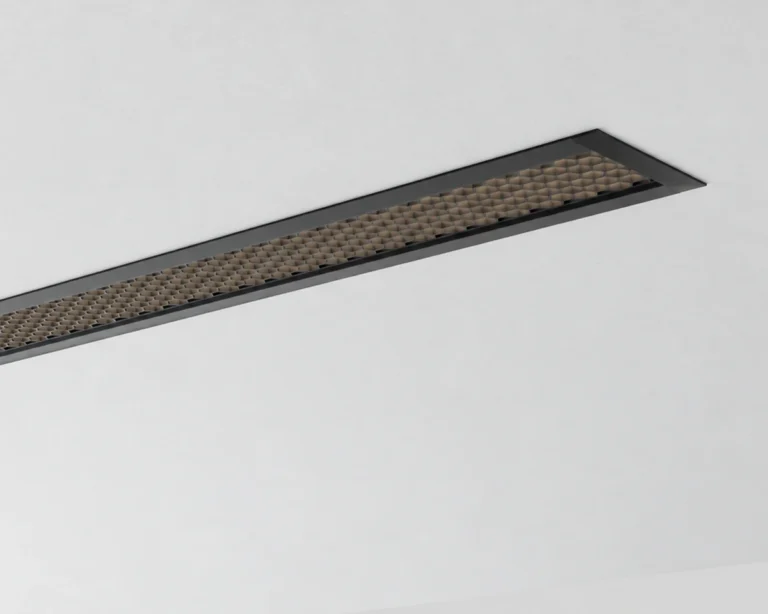 AM Series recessed linear light with a black louver optic in a ceiling