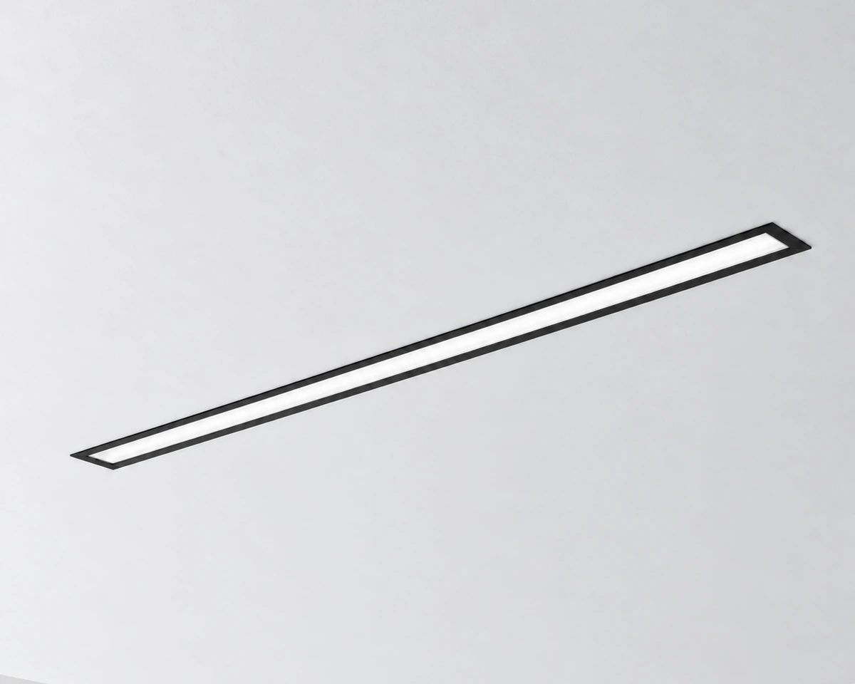 BOC Series recessed linear light with black trim installed in a ceiling
